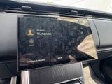 a picture of a car dashboard with a sign on it