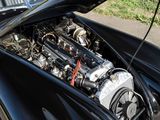 a black car with an engine in the trunk