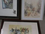 trois aquarelles encadrées représentant un village et une église