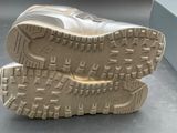 a close up of a pair of shoes on a table