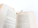 an open book that is sitting on a table