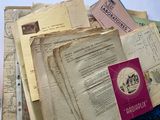 a pile of old books sitting on top of a table
