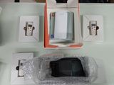 a box with a cell phone inside of it on a table
