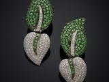a pair of emerald and diamond earrings