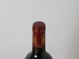 a bottle of wine that is sitting on a table