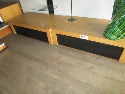 a wooden bench with a glass shelf on top of it