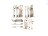 a lot of silverware on a white surface