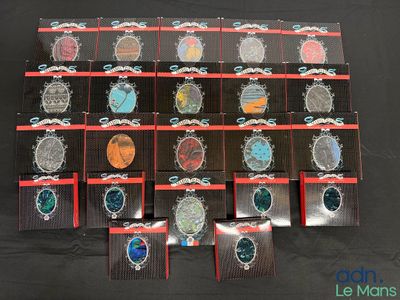 a lot of different colored stones in a display case