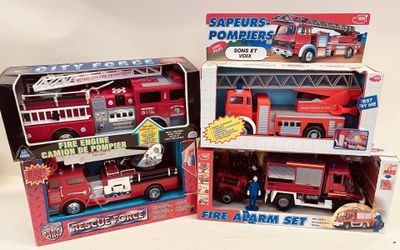 three toy firetrucks and a fire truck in the same box