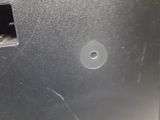 a close up of a metal object with a hole in it