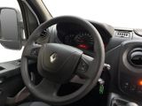 the interior of a car with a steering wheel and dashboard controls