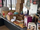 many boxes and boxes on the counter in the store