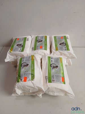 six bags of rice sitting on top of a white counter