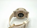 a watch that is sitting on a white surface