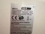 a label on the back of a white refrigerator
