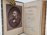 un vieux livre sur lequel figure l'image d'un homme tenant un gant