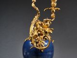 pair of vases in the style of person