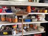 a shelf with various items on it in a garage