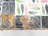 a close up of a piece of art on a table