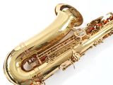 an image of a gold saxophone on a white background