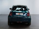 a small car that is parked in a room