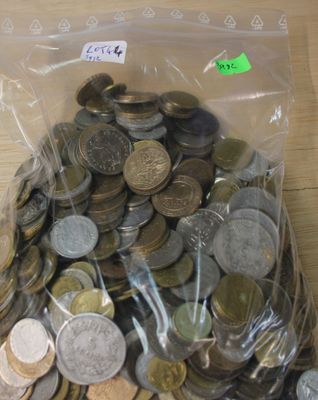 a bag full of coins sitting on a table