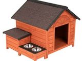 une photo d'une niche en bois contenant deux gamelles
