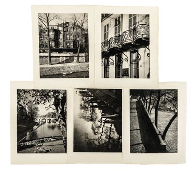 four black and white photographs of a bridge over a river