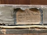 a piece of paper on top of a piece of wood