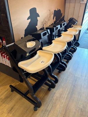 a lot of chairs that are lined up in a row