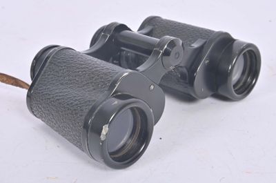 a pair of binoculars that are sitting on a table