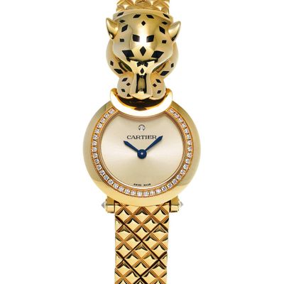 a close up of a wrist watch with a gold bracelet