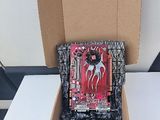 a cardboard box with a picture of a horse inside of it