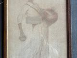 une vieille photo d'un homme portant un panier sur son épaule