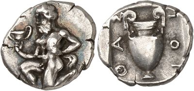 a close up of a coin with a man on it