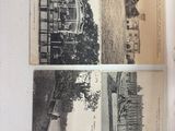 un livre ouvert sur lequel figurent des images d'une maison et d'autres bâtiments