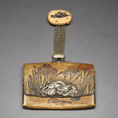 an image of a purse with a frog on it