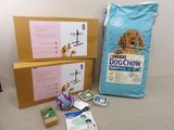 two boxes of dog chow and a bag of dog chow on the table