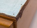 a close up of a piece of wood on a table