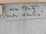 a close up of a piece of art with writing on it