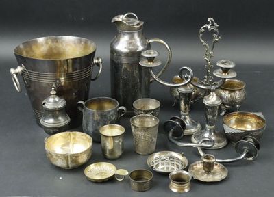 a lot of silver items that are on a table