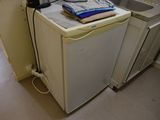 an image of a kitchen with a dishwasher and a washing machine