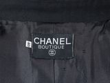 the label on the back of a chanel coat