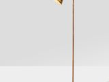 a brass floor lamp with a wooden base and a brass shade
