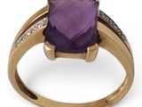 a close up of a ring with an amethorate and diamonds