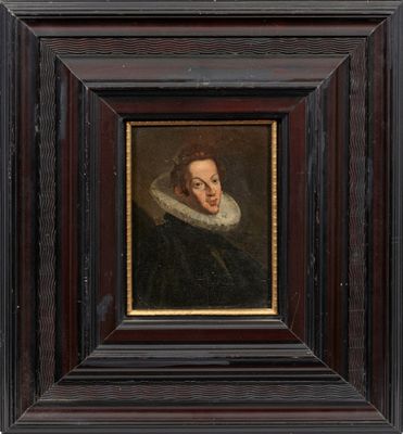 portrait d'un homme vêtu d'un manteau noir à col blanc