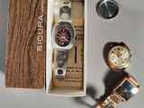 a box with a watch and a lighter next to it