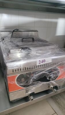 a box of food sitting on a counter in a kitchen