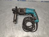 a drill that is sitting on top of a table