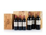 six bottles of red wine in a wooden box with a wooden box